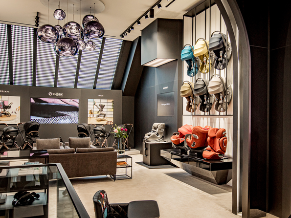 CYBEX Flagship Store Amsterdam showcasing modern strollers and car seats in a stylish display.