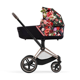 CYBEX Platinum Spring Blossom Collection Priam Lux Carry Cot shown on Priam Frame - Dark
