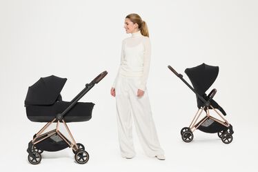 An image of the CYBEX Platinum Mios Frame - Style Collection Stroller, highlighting the Generous in Comfort. Compact by Design. feature.