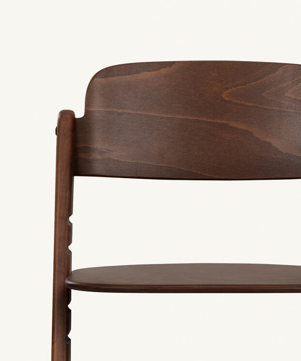 High-quality wooden chair with a simple design, showcasing the backrest and seat in dark wood