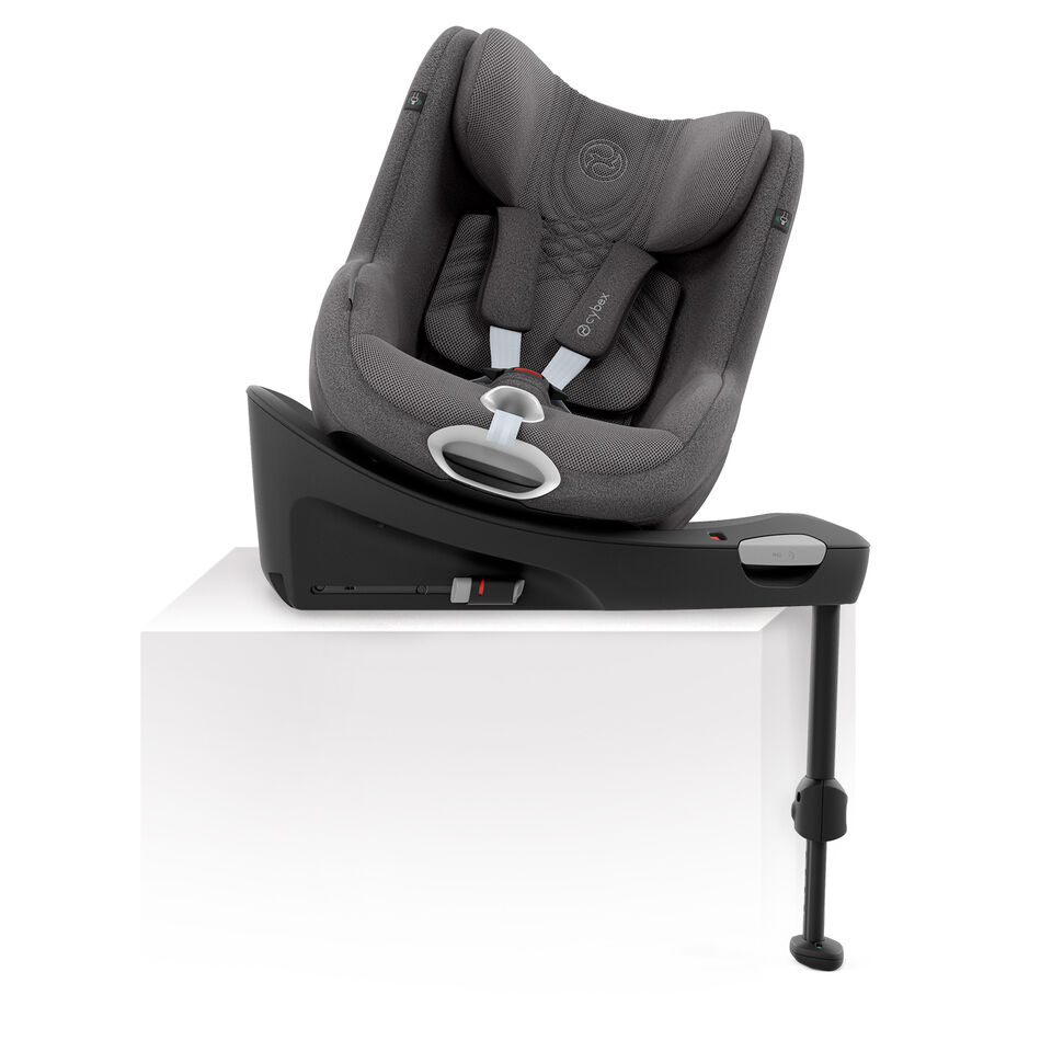 Autosedačka Sirona T na z&aacute;kladně, otočen&aacute; do strany.