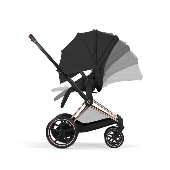 An image of the CYBEX Platinum e-Priam , highlighting the Ergonomic Lie-Flat with XXL extendable Canopy feature.