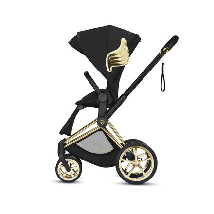 Black by Jeremy Scott Wings pram with gold accents and wing motif