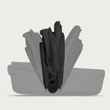 An image of the CYBEX Platinum Priam Fold Lux Carry Cot - Style Collection Stroller, highlighting the Hand Luggage Compatible when Folded off Frame feature.