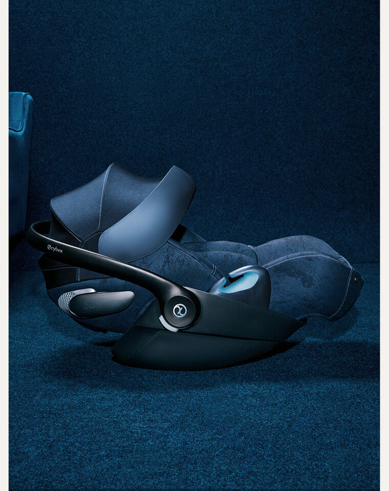 Side view of a Rebellious Luxury Cloud T infant car seat.