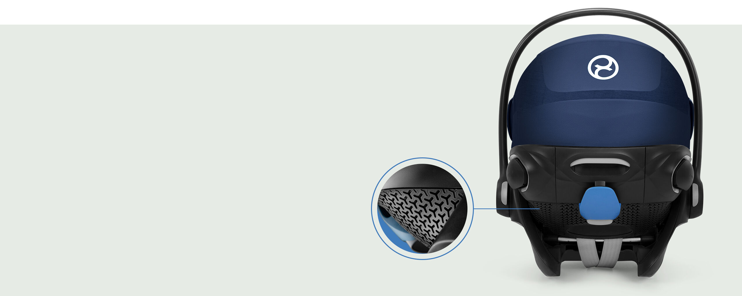 Rear view of the Cloud G reclining infant car seat in blue, with a close-up of the safety mechanism.