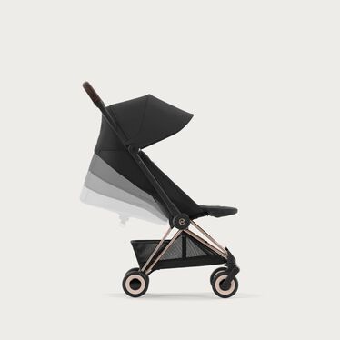 An image of the CYBEX Platinum Coya Buggy, highlighting the Ergonomic Lie-flat & Integrated Leg rest feature.