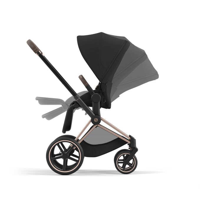 An image of the CYBEX Platinum Priam Jeremy Scott - Car Stroller, highlighting the One-hand recline and fold feature.