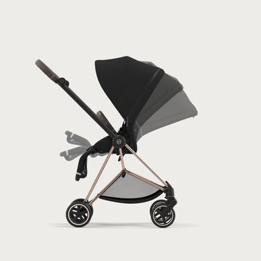 An image of the CYBEX Platinum Mios Jeremy Scott - Wings Stroller, highlighting the One-hand recline and fold feature.