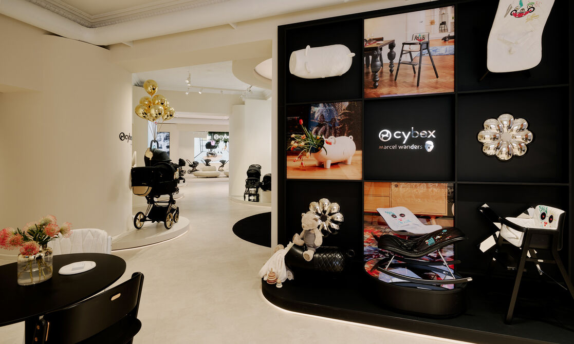 A display of our Rocker Chair. On the left, a table with our High Chairs.