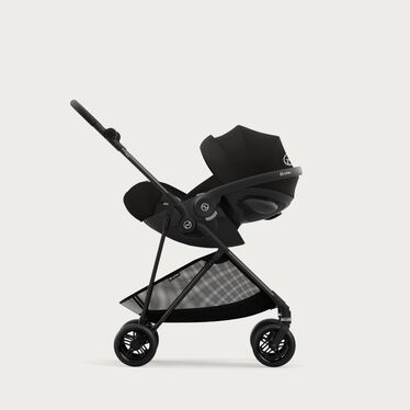 An image of the CYBEX Gold Melio Carbon Stroller, highlighting the Travel System Ready feature.