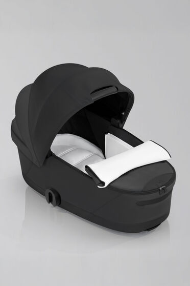 Immagine di una Navicella Richiudibile Lux Carry Cot e del suo materassino ergonomico.