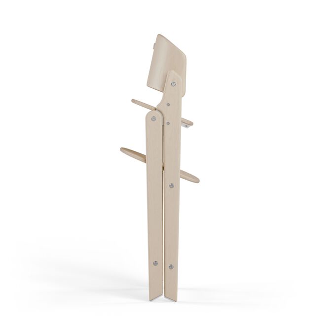 Image du CYBEX Gold Click & Fold 3-in-1 Highchair, mettant en avant la fonctionnalité Tient debout seule une fois pliée.