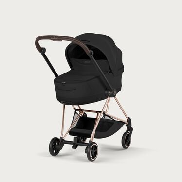 An image of the CYBEX Platinum Mios Frame - Style Collection Stroller, highlighting the Generous in Comfort. Compact by Design. feature.