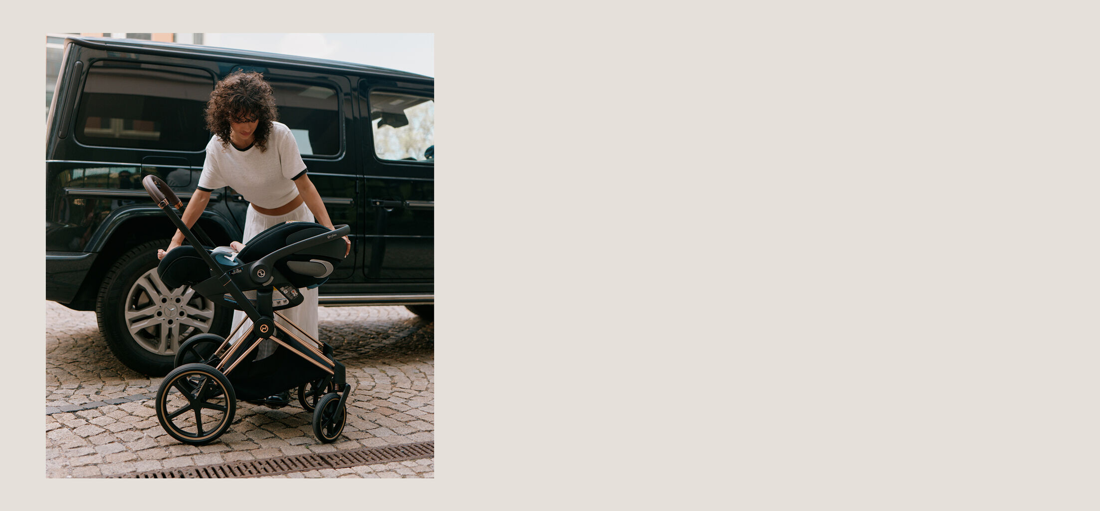 A video of a mother showcasing a CYBEX infant car seat and its features while a baby is inside.