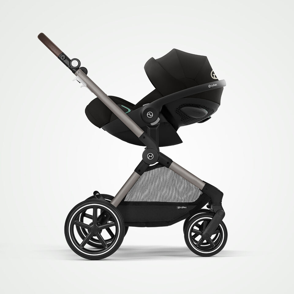 Side view of the CYBEX EOS LUX stroller with attached infant car seat.