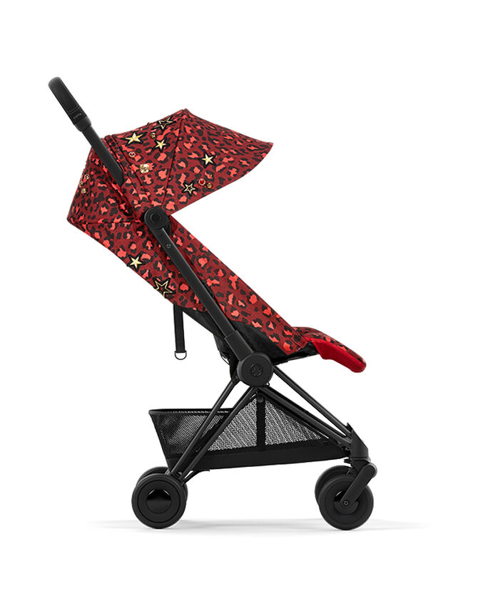CYBEX Rockstar pushchair in red with leopard print and star details, side view.