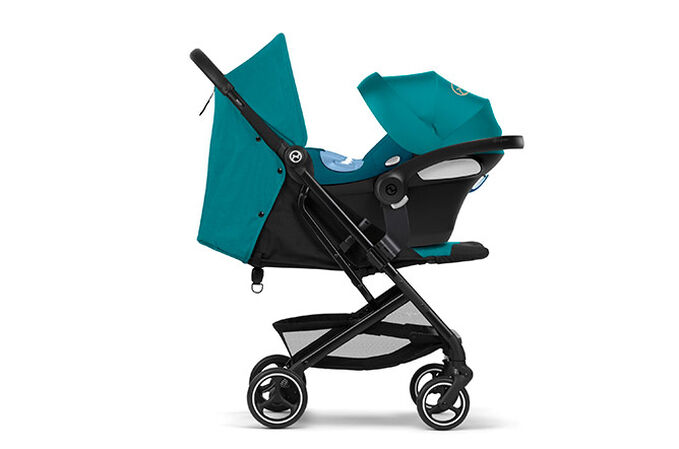 Ein Bild des CYBEX Gold Beezy Buggy, das das Merkmal Reisesystem mit Kindersitz hervorhebt.