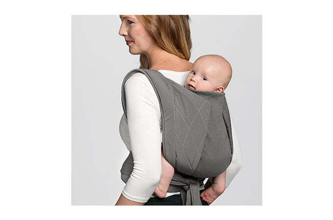 An image of the CYBEX Platinum YEMA.tie Baby Carrier, highlighting the Multi-functional head and neck support feature.