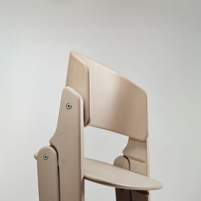 High-quality Click and Fold high chair in light wood design.