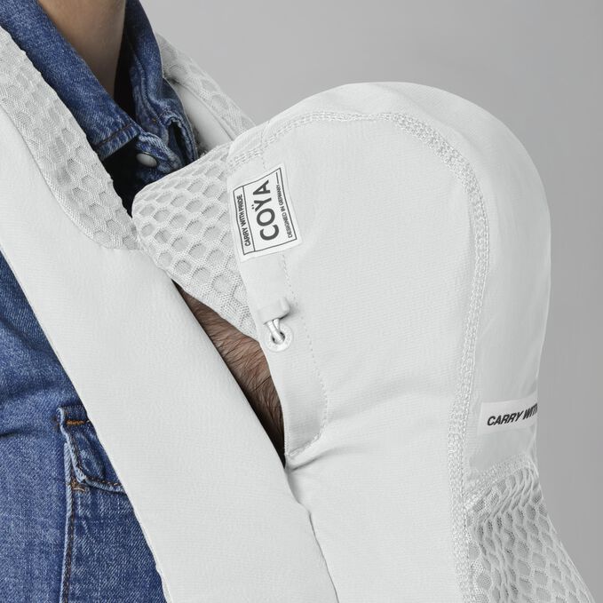 An image of the CYBEX Platinum Coya Carrier Baby Carrier, highlighting the Protective Hood feature.