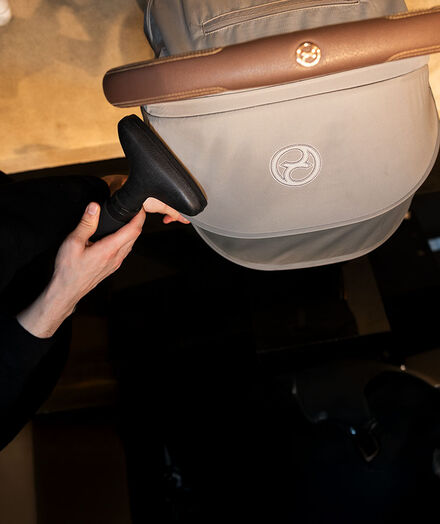 A CYBEX pushchair getting steamed.
