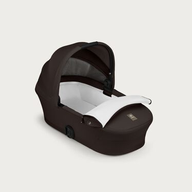 An image of the CYBEX Gold Melio Cot Stroller, highlighting the Cozy & Spacious Interior feature.