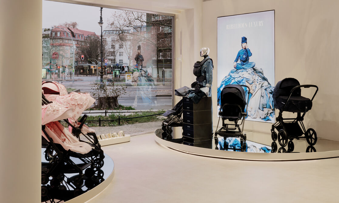 Multiple CYBEX strollers from fashion collections on display.