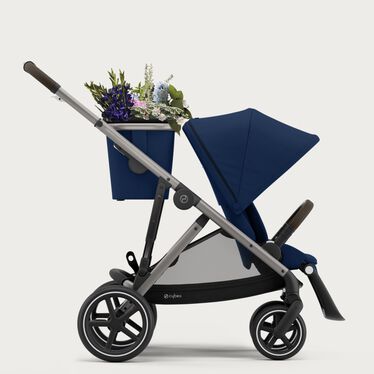 An image of the CYBEX Gold Gazelle S Sibling Stroller, highlighting the Two Shopping Baskets feature.