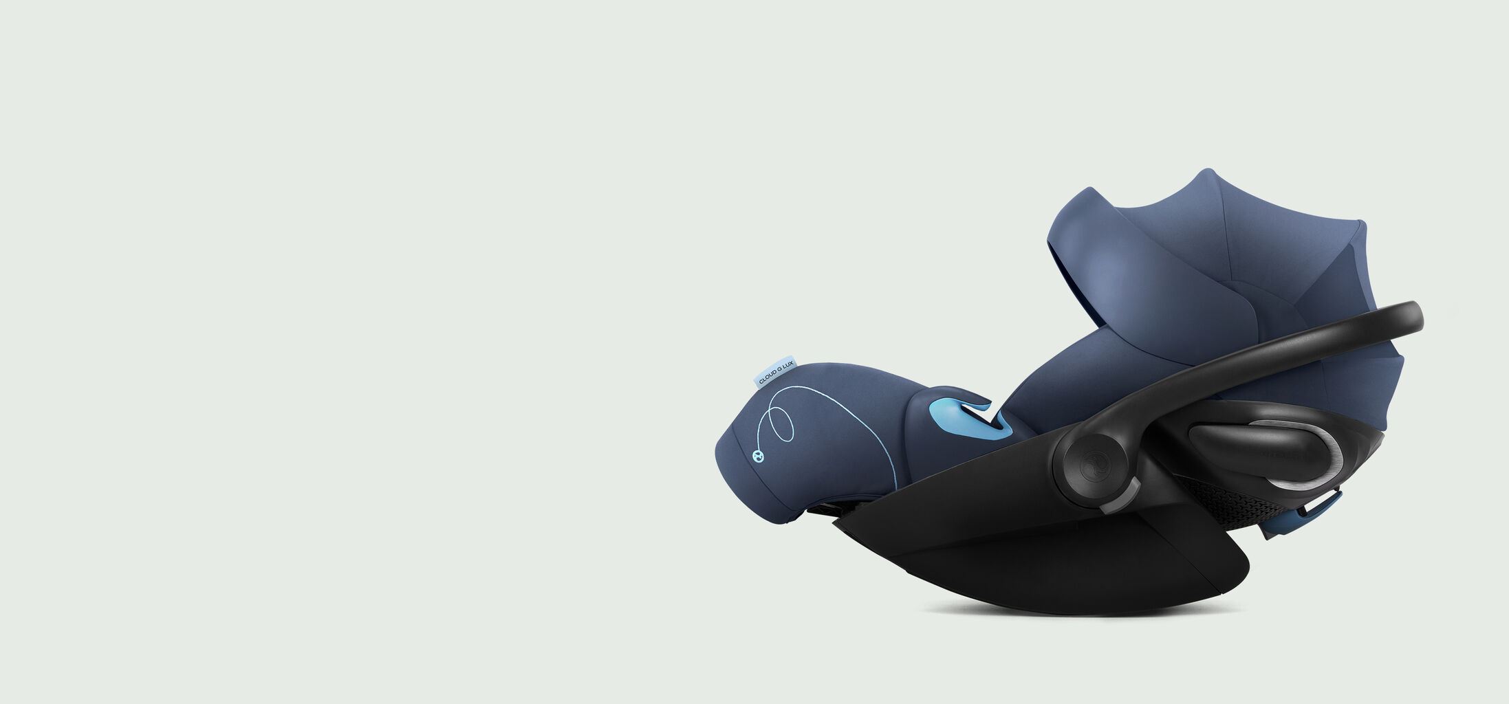 Blue Cloud G reclining infant car seat on a light background.