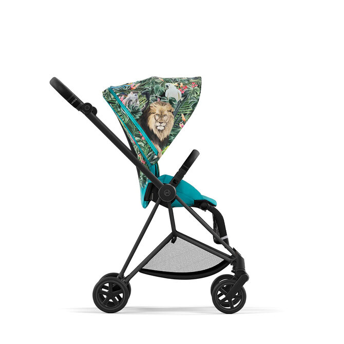 Pushchair with tropical design and lion motif on the hood, by DJ Khaled.