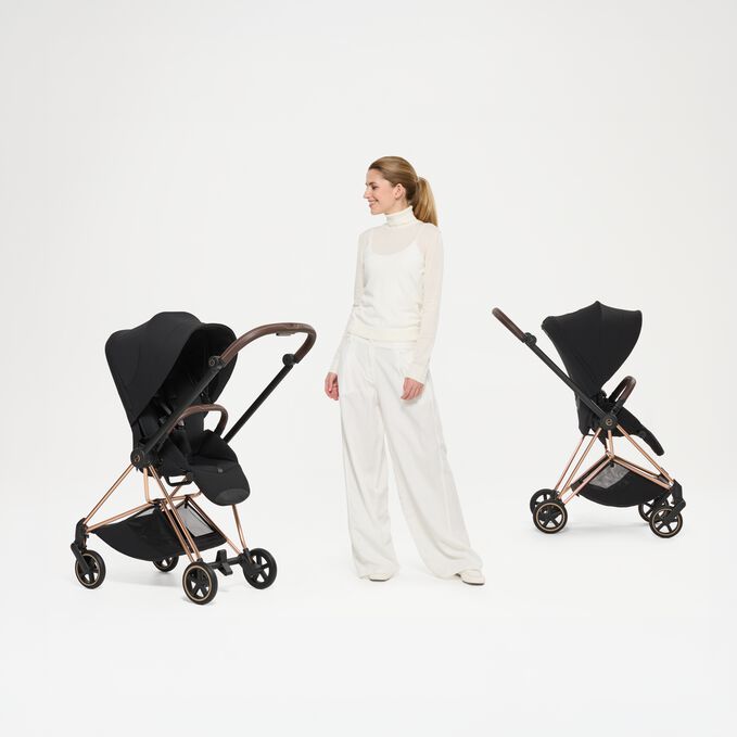 An image of the CYBEX Platinum Mios - Style Collection Stroller, highlighting the Reversible Seat Unit feature.