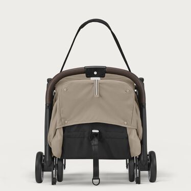 An image of the CYBEX Gold Orfeo Buggy, highlighting the Integrated Carry Strap feature.