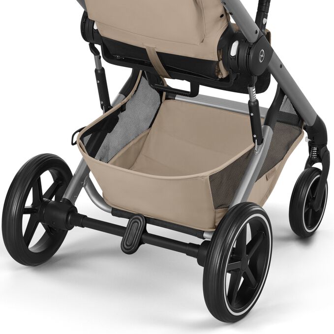 An image of the CYBEX Gold Balios S Lux Stroller, highlighting the Super-Sized Color-Coordinated Shopping Basket feature.
