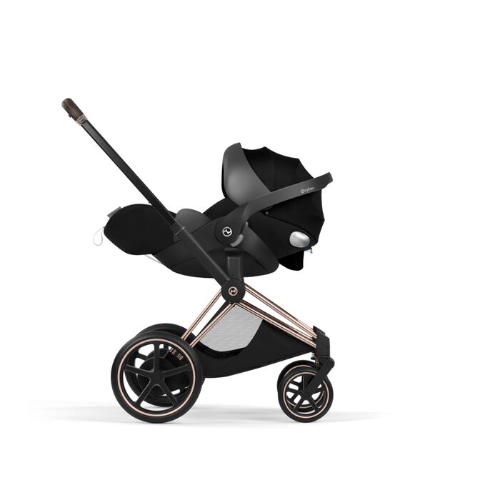 An image of the CYBEX Platinum Cloud Q Infant Car Seat, highlighting the Comfortable out of the car onto the stroller feature.