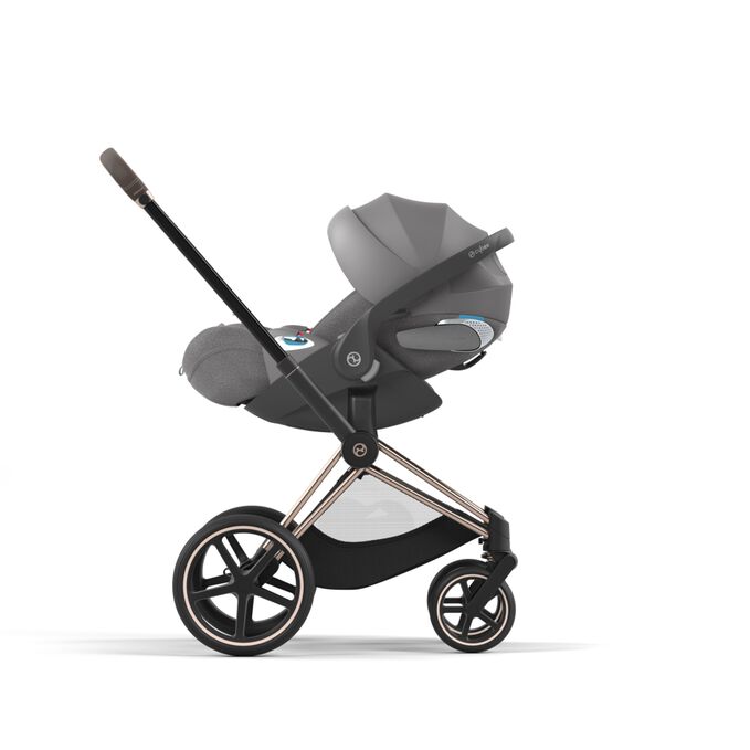 An image of the CYBEX Platinum Cloud T i-Size Infant Car Seat, highlighting the Easy transition from car to stroller feature.