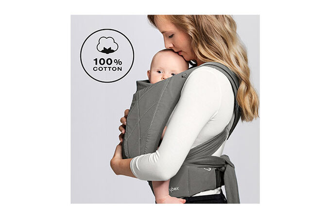 An image of the CYBEX Platinum YEMA.tie Baby Carrier, highlighting the Wrap-like cotton fabric feature.