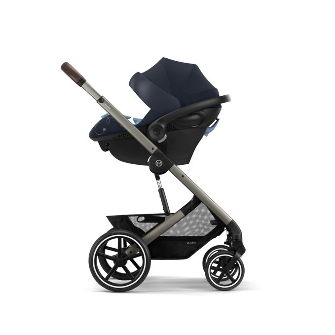An image of the CYBEX Gold Aton G with Base Infant Car Seat, highlighting the Travel System Compatible feature.