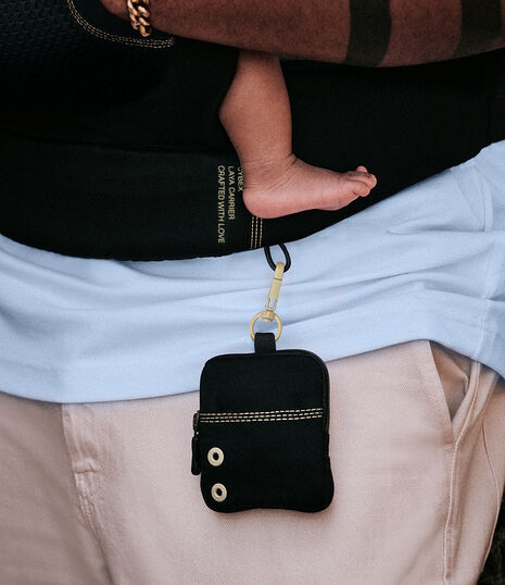 Close up of the detachable coin purse that comes with the Laya baby carrier.