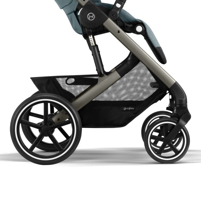 An image of the CYBEX Gold Balios S Lux 2023 Stroller, highlighting the Never-Flat All-Terrain Wheels feature.
