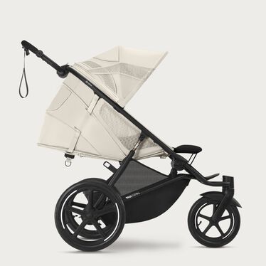 An image of the CYBEX Gold Avi Spin Stroller, highlighting the Ergonomic Lie-flat with Integrated Leg rest feature.