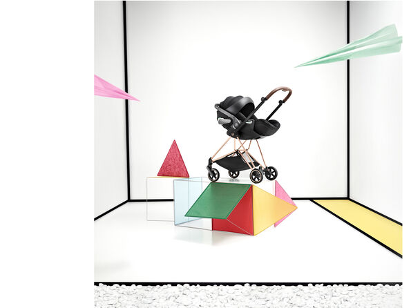 A CYBEX Mios stroller with an infant car seat attached.