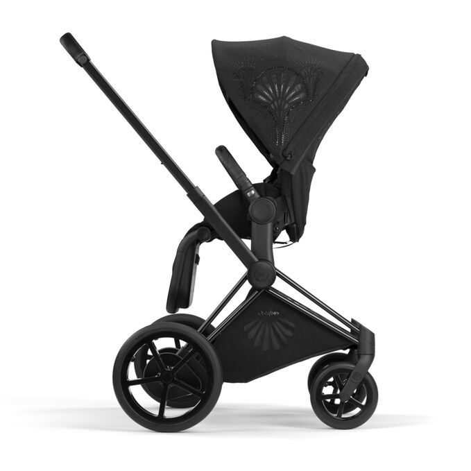 An image of the CYBEX Platinum e-Priam - La Parisienne Stroller, highlighting the Reversible Seat Unit feature.