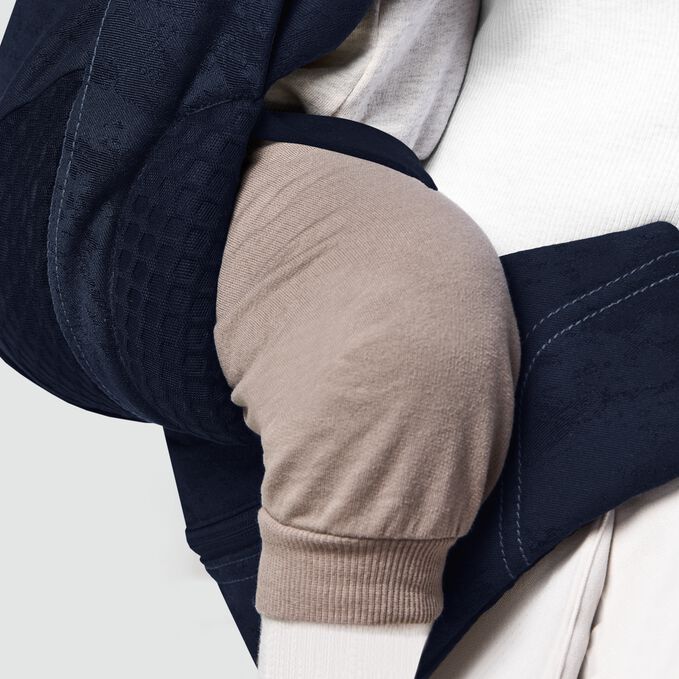 An image of the CYBEX Platinum Coya Carrier Rebellious Luxury Baby Carrier, highlighting the All-round Safety feature.