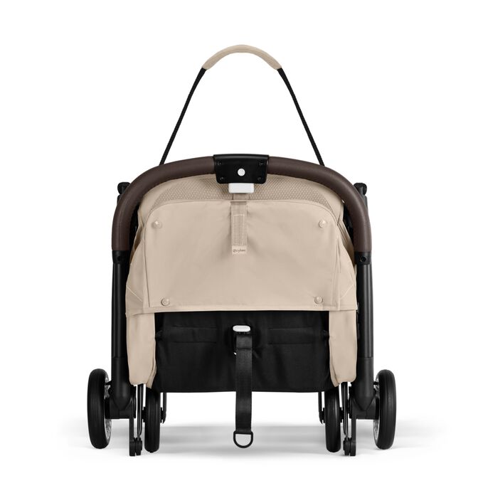 Image du CYBEX Gold Orfeo Buggy, mettant en avant la fonctionnalit&eacute; Bandouli&egrave;re de transport int&eacute;gr&eacute;e.