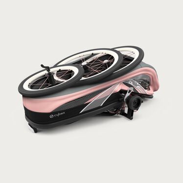 An image of the CYBEX Gold Zeno Frame Cross Country Ski Trailer, highlighting the Compact Fold feature.