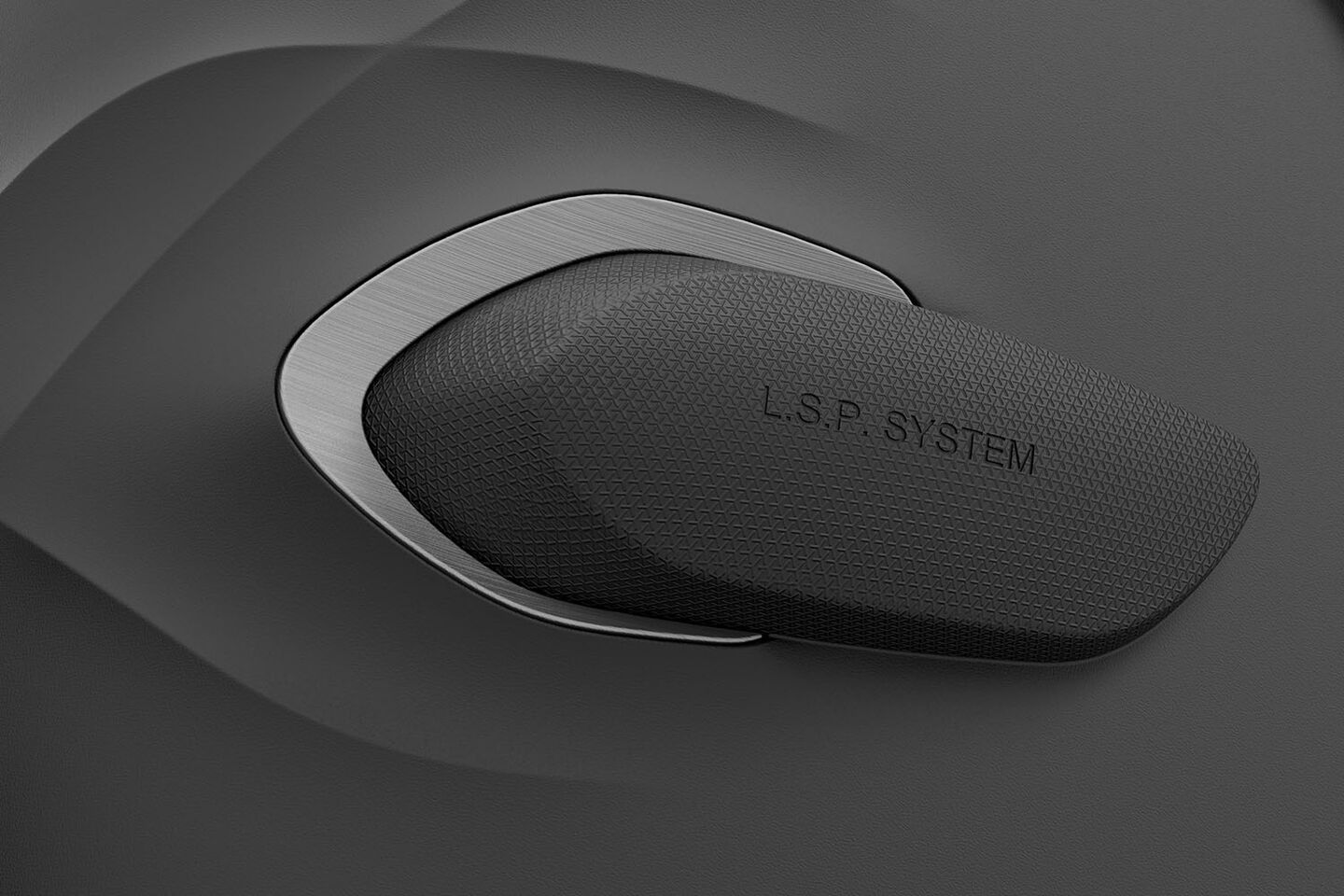 A black, textured car part with the inscription "L.S.P. System."
