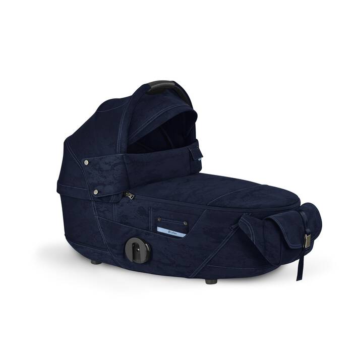 CYBEX Mios Lux Carry Cot - Rebellious Luxury Denim Blue in Rebellious Luxury Denim Blue image number 1 CYBEX Mios Lux Carry Cot - Rebellious Luxury Denim Blue in Rebellious Luxury Denim Blue large-cybex-row image number 1